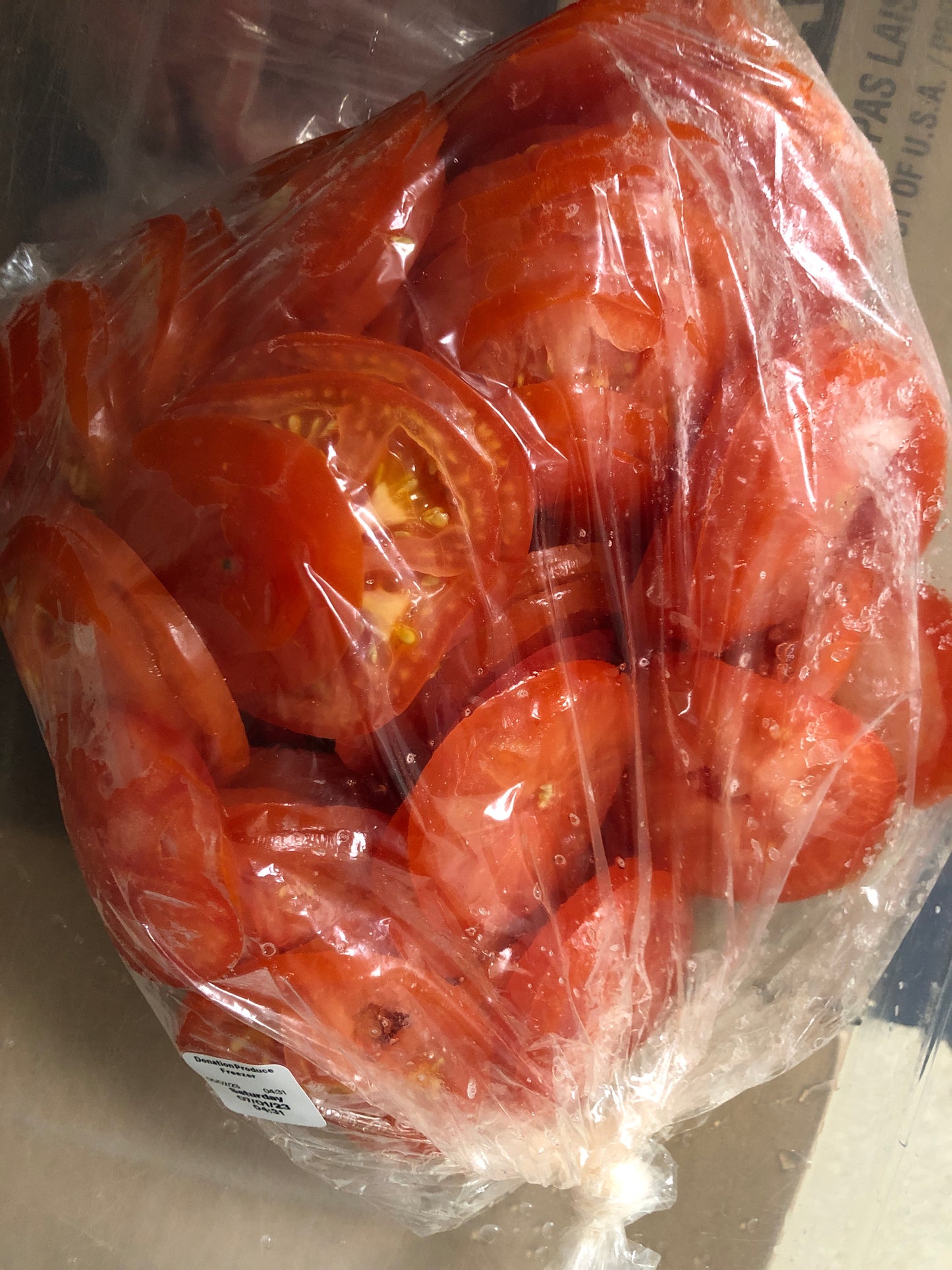 Bag Frozen Sliced Tomatoes. Ideal for cooking sauces or soup